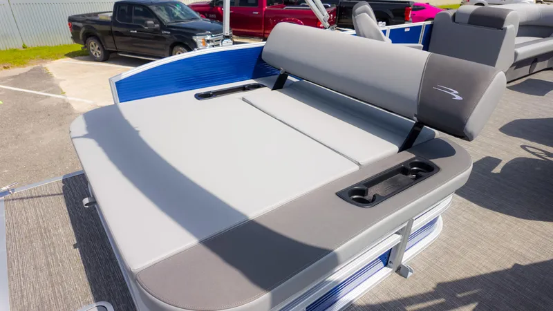 Slide: The Image of 2024 Bennington 22 SVSB pontoon boat with gray seating and cup holders. - 15