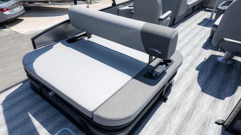 Slide: The Image of 2025 Bennington 23 SSB boat interior with gray seating and flooring. - 8