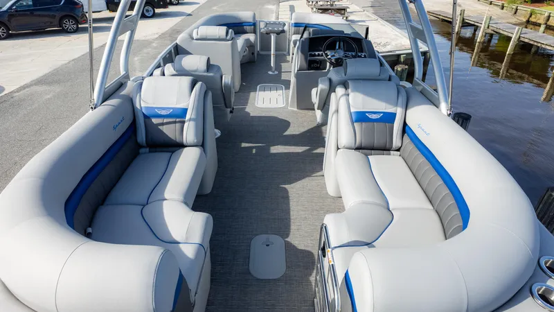 Slide: The Image of 2024 Bennington 24 LXSFBA pontoon boat with luxurious seating and modern design. - 9