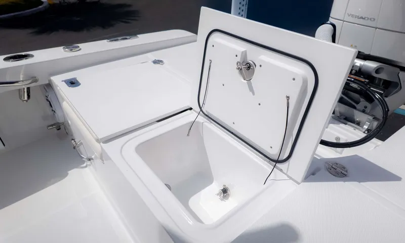 Slide: The Image of Open storage compartment on 2025 Everglades 253CC boat, showcasing sleek design and functionality. - 13