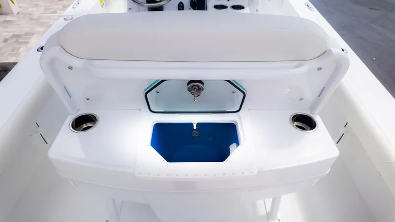 Slide: The Image of 2025 Everglades 253CC boat interior with livewell and seating area. - 14