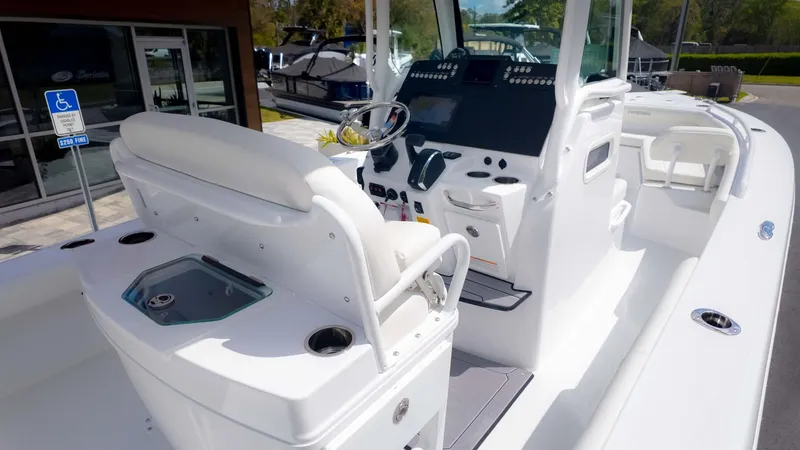Slide: The Image of 2025 Everglades 253CC boat interior with modern console and seating. - 8