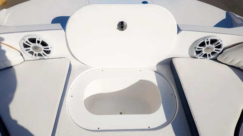 Slide: The Image of 2025 Stingray 192SC boat interior with speakers and storage compartment. - 20