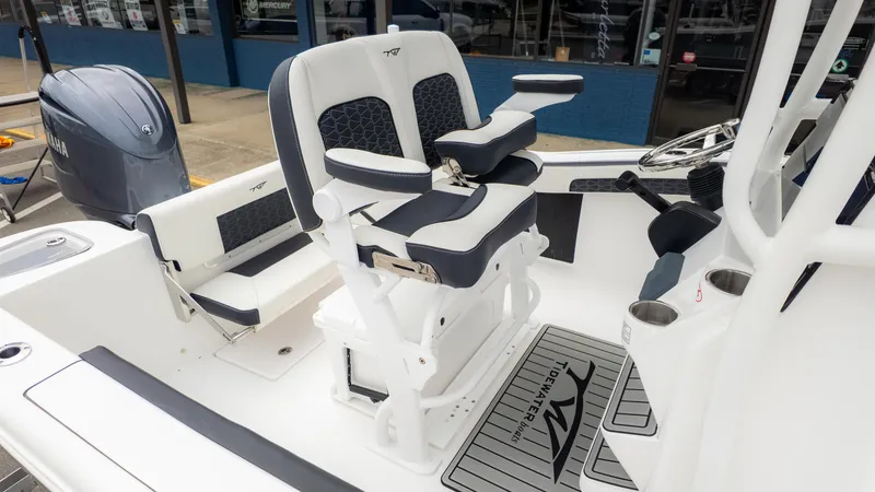 Slide: The Image of 2025 Tidewater 210CC boat interior with Yamaha engine, featuring comfortable seating and modern design. - 11
