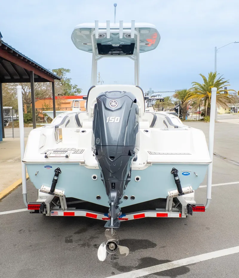 Slide: The Image of 2025 Tidewater 210CC boat with Yamaha 150 outboard motor on trailer. - 5