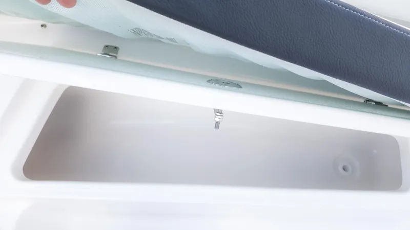 Slide: The Image of Open storage compartment in 2025 Tidewater 210CC boat. - 16
