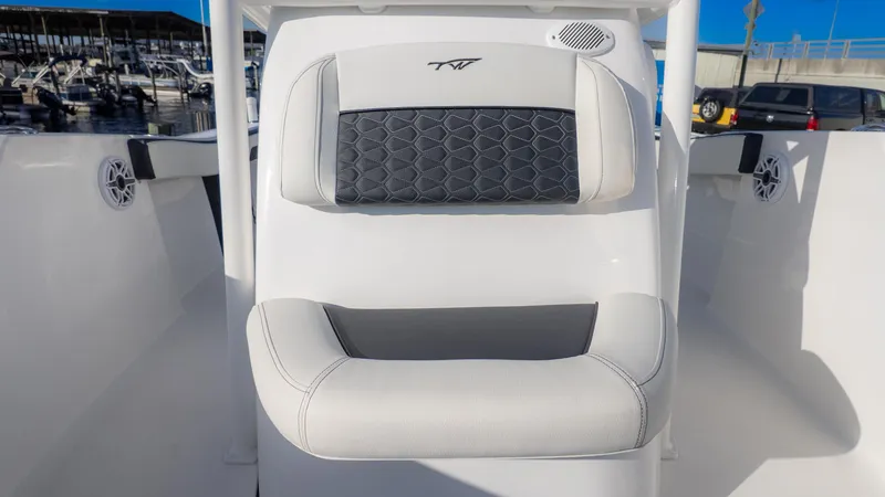 Slide: The Image of 2025 Tidewater 220cc boat seat with stylish black and white upholstery. - 16