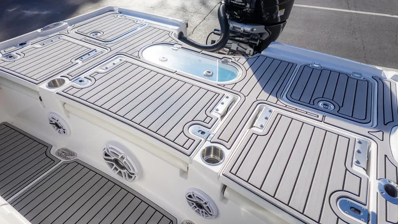 Slide: The Image of 2025 Tidewater 2500 Carolina Bay boat deck with sleek design and modern features. - 12