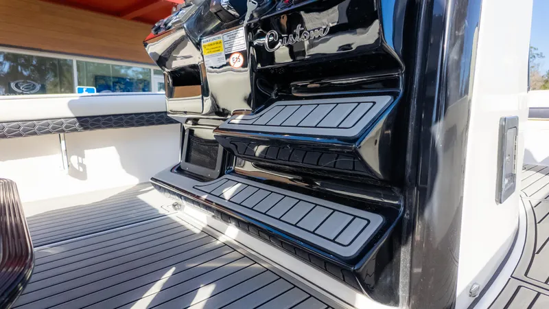 Slide: The Image of 2025 Tidewater 2500 Carolina Bay boat with sleek black detailing and custom features. - 23