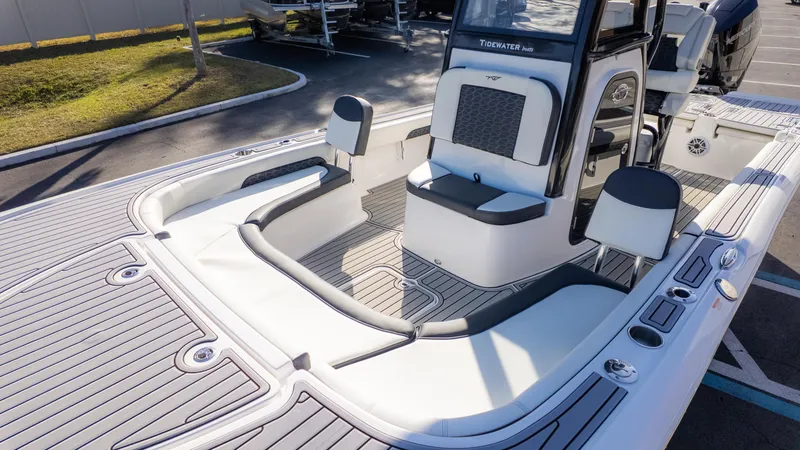 Slide: The Image of 2025 Tidewater 2500 Carolina Bay boat interior with sleek seating and modern design. - 3