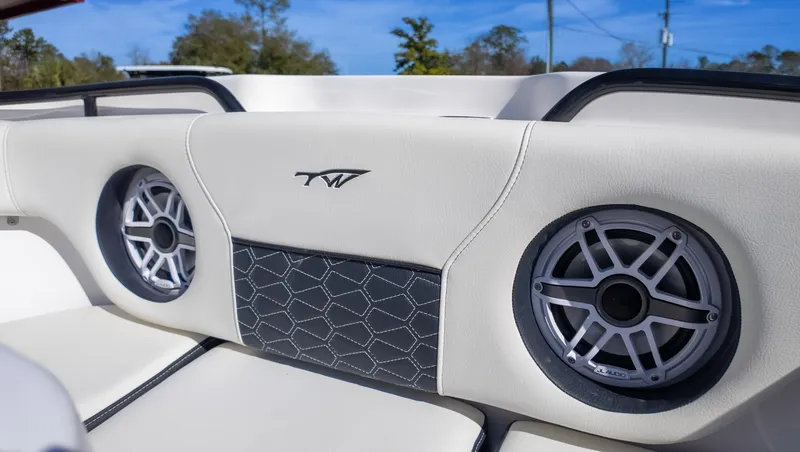Slide: The Image of 2025 Tidewater 282CC boat interior with speakers and stylish upholstery. - 30