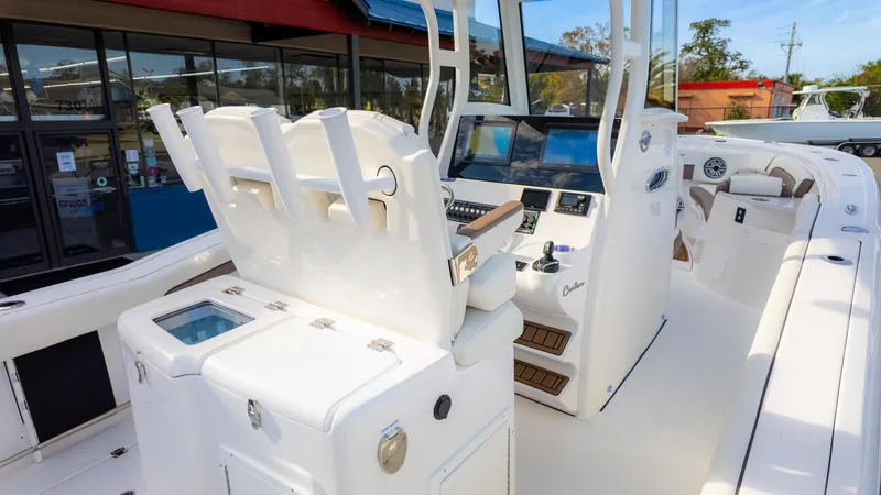 Slide: The Image of 2025 Tidewater 282CC boat interior with modern helm and seating. - 11