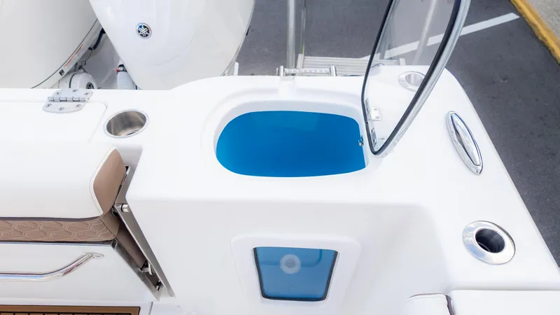 Slide: The Image of 2025 Tidewater 282CC boat with open livewell and seating area. - 15