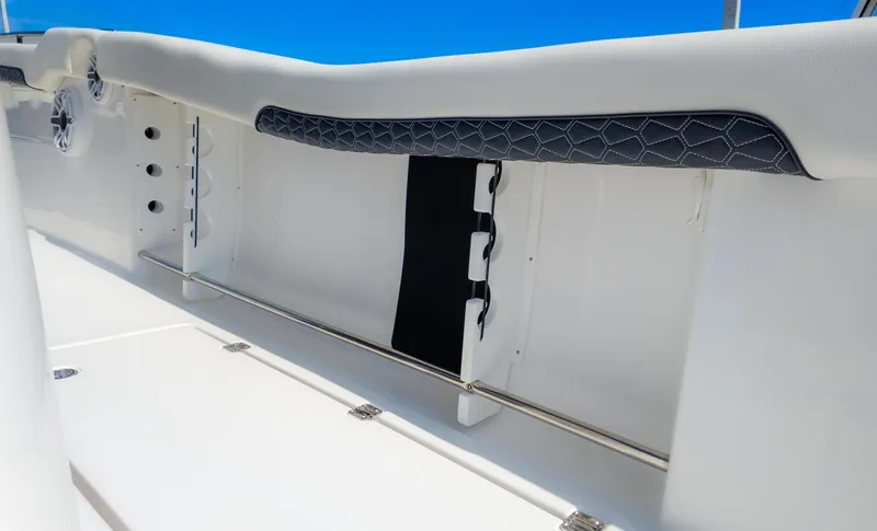 Slide: The Image of Interior view of 2025 Tidewater 320cc boat, featuring sleek white design and modern detailing. - 17