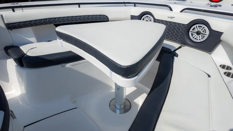 Slide: The Image of 2025 Tidewater 320cc boat interior with sleek seating and modern design. - 23