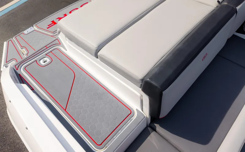 Slide: The Image of 2024 Cobalt CS23 Surf boat with sleek seating and stylish deck design. - 16