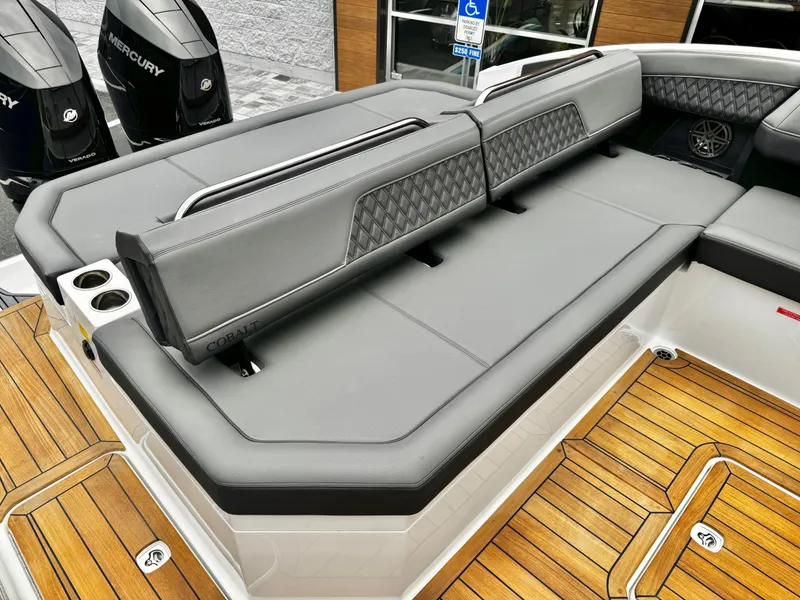 Slide: The Image of Luxury seating on 2025 Cobalt R33 boat with teak flooring and Mercury engines. - 12