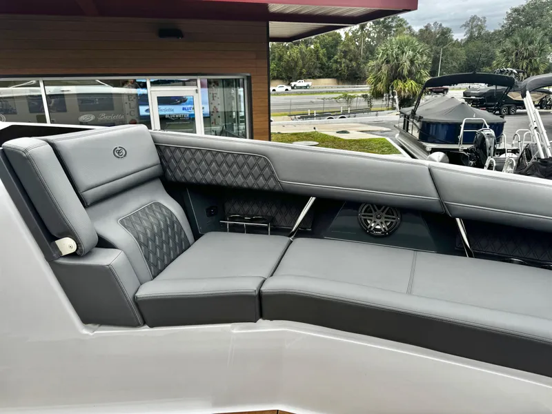 Slide: The Image of Luxurious seating on 2025 Cobalt R33 boat with diamond-stitched upholstery. - 22