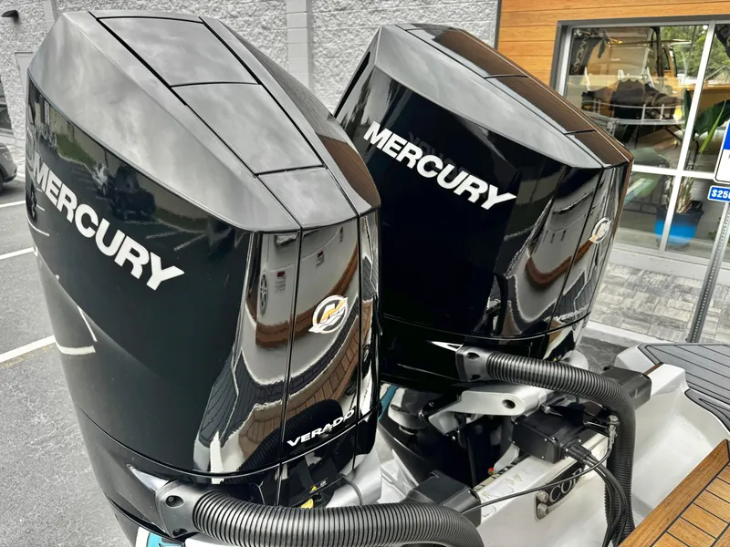 Slide: The Image of Twin Mercury Verado outboard engines on a 2025 Cobalt R33 boat. - 26