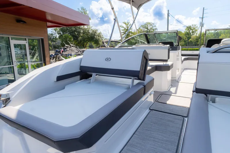Slide: The Image of 2024 Cobalt R6 OB boat interior with sleek seating and modern design. - 21