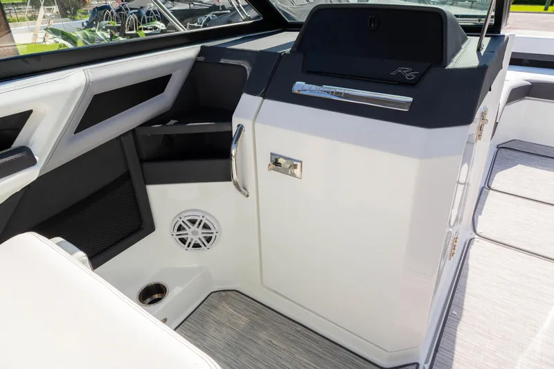 Slide: The Image of 2024 Cobalt R6 OB boat interior with sleek design and modern features. - 35