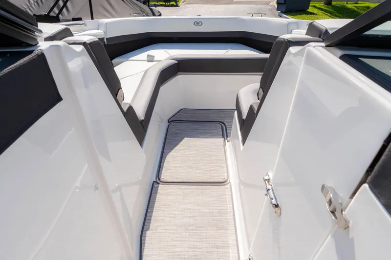Slide: The Image of 2024 Cobalt R6 OB boat interior with sleek seating and modern design. - 42