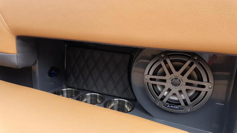 Slide: The Image of 2025 Cobalt R6OB interior with JL Audio speaker and cup holders. - 18