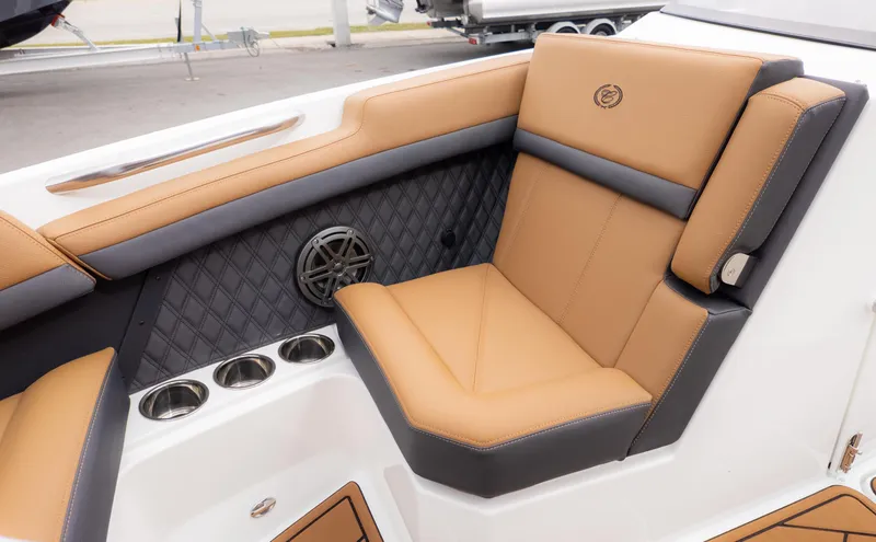Slide: The Image of Luxurious seating in 2025 Cobalt R6OB boat with tan and black upholstery. - 26
