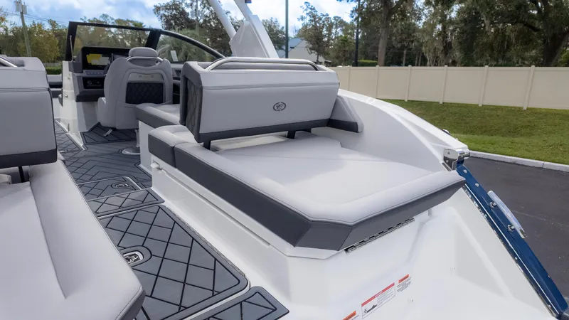 Slide: The Image of 2025 Cobalt R6OB boat interior with luxurious seating and modern design. - 15