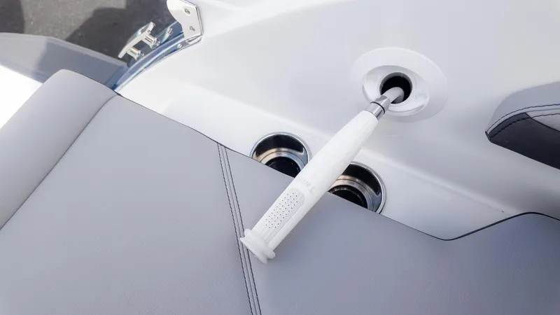 Slide: The Image of 2025 Cobalt R6OB boat interior detail with sleek seating and modern design elements. - 19