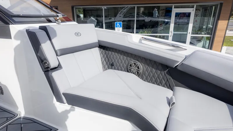 Slide: The Image of 2025 Cobalt R6OB boat interior with luxurious seating and modern design. - 26