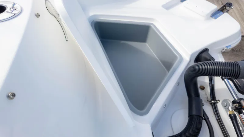 Slide: The Image of 2025 Stingray 192SC boat storage compartment with sleek design and durable materials. - 12