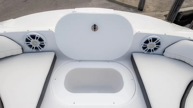 Slide: The Image of 2025 Stingray 192SC boat interior with speakers and seating area. - 21
