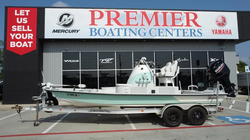 Slide: The Image of 2018 Shoalwater 21 CAT DLX boat at Premier Boating Centers dealership. - 1