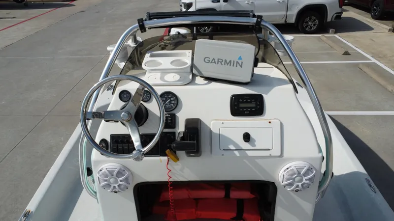 Slide: The Image of 2018 Shoalwater 21 CAT DLX boat dashboard with Garmin navigation system. - 24