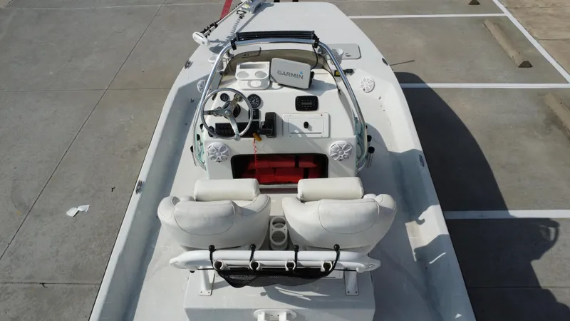 Slide: The Image of 2018 Shoalwater 21 CAT DLX boat with dual seats and Garmin navigation system. - 25
