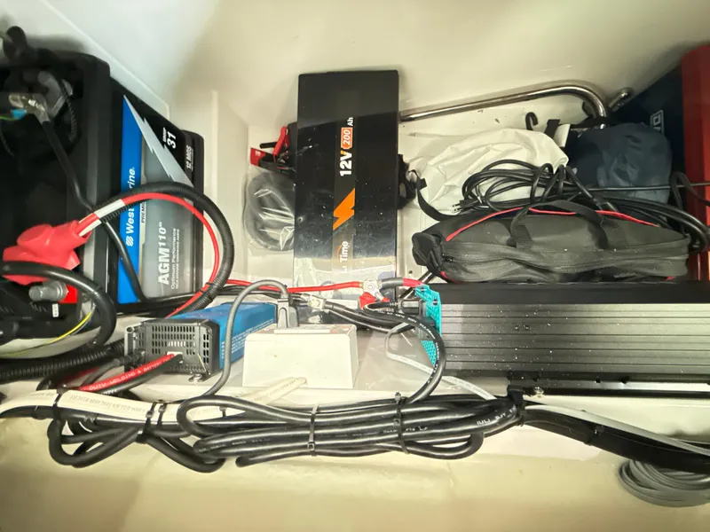 Slide: The Image of Electrical components and wiring inside a 2019 Axopar 28 CABIN boat. - 42