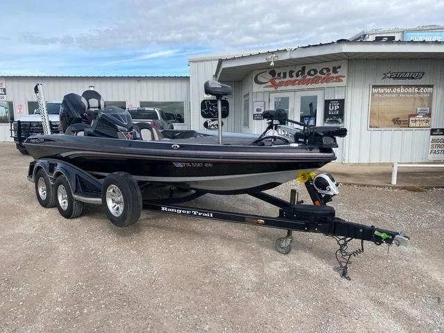 Slide: The Image of 2019 Ranger Z518 boat on trailer outside Outdoor Specialties store. - 1