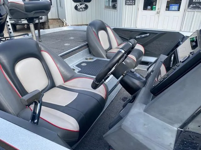 Slide: The Image of 2019 Ranger Z518 boat interior with dual seats and steering console. - 6