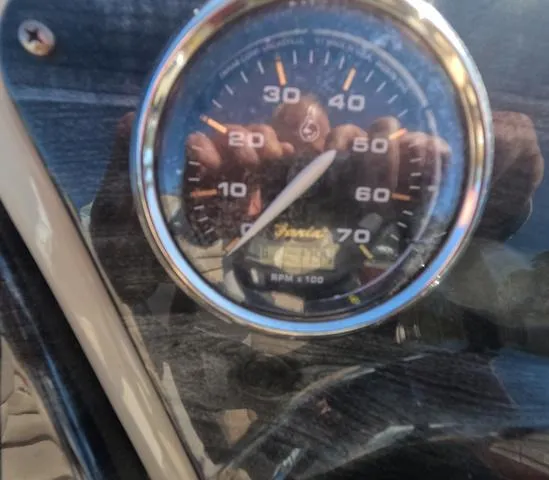 Slide: The Image of Close-up of a 2015 Sweetwater SW 2286 SLC speedometer, showing reflections. - 16