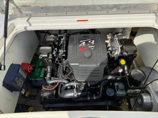 Slide: The Image of Engine compartment of a 2007 Tahoe Q7i boat featuring a MerCruiser 4.3 MPI engine. - 5