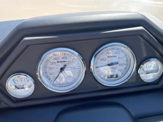 Slide: The Image of Dashboard of 2025 Bentley Pontoons 223 Legacy Swingback with Suzuki gauges. - 10