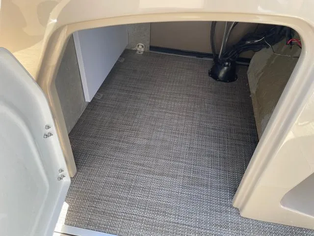 Slide: The Image of Interior storage space of 2025 Bentley Pontoons 223 Legacy Swingback boat. - 13