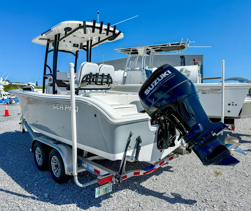 Slide: The Image of 2023 Sea Pro 219 Center Console boat with Suzuki outboard motor on trailer. - 4