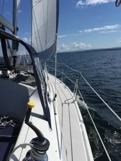 Slide: The Image of Sailing on a 2010 Catalina 350 yacht under clear blue skies. - 5