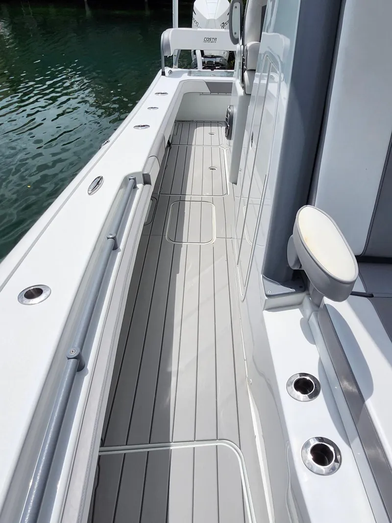 Slide: The Image of 2022 Costa Custom Boats 264 HC deck with sleek design and modern features. - 10