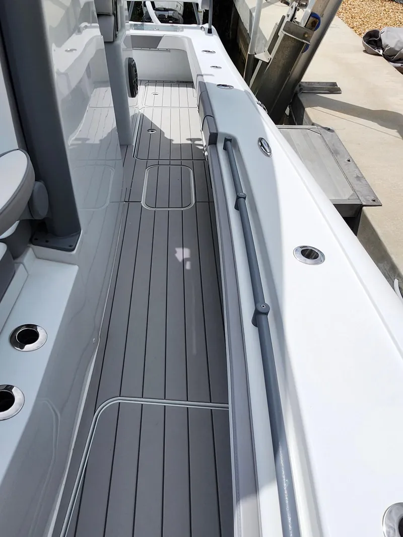 Slide: The Image of 2022 Costa Custom Boats 264 HC deck, featuring sleek design and modern fittings. - 11