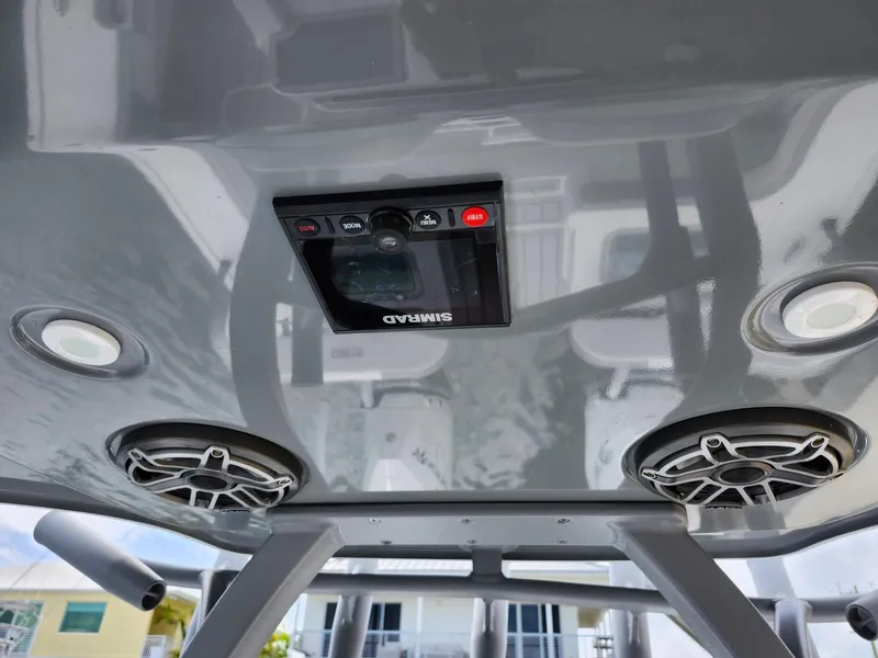 Slide: The Image of 2022 Costa Custom Boats 264 HC with Simrad electronics and speakers on the ceiling. - 22