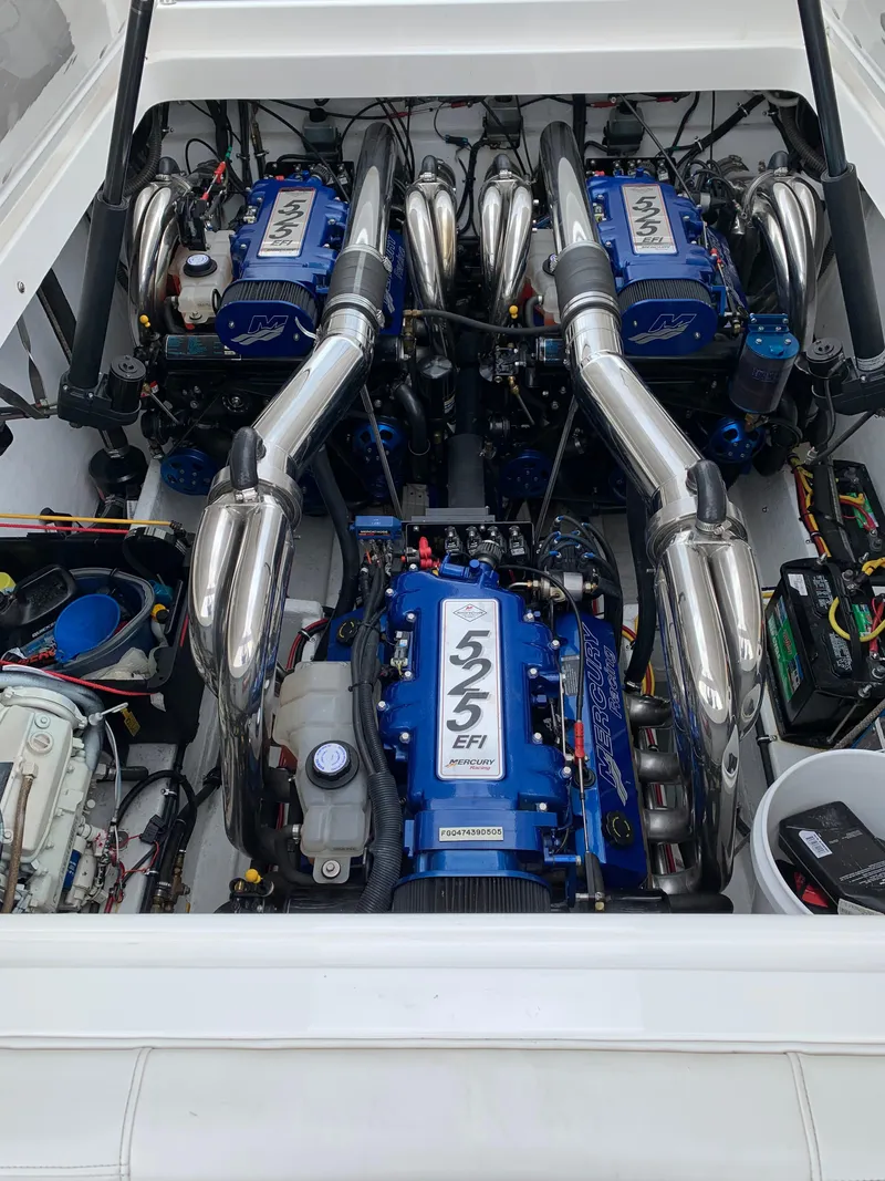 Slide: The Image of 2005 Fountain 47 Lightning boat engine compartment with triple Mercury 525 EFI engines. - 5