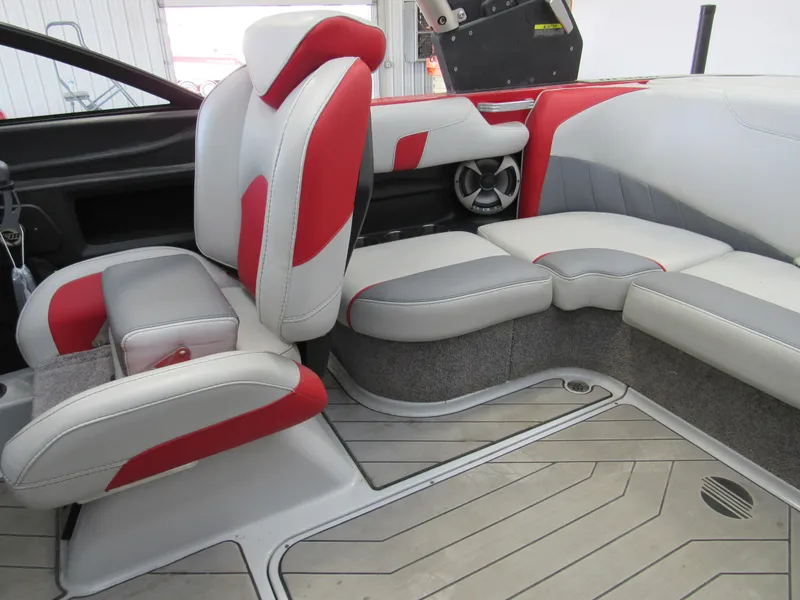 Slide: The Image of 2019 Malibu Wakesetter 20 VTX interior with red and gray seating. - 6